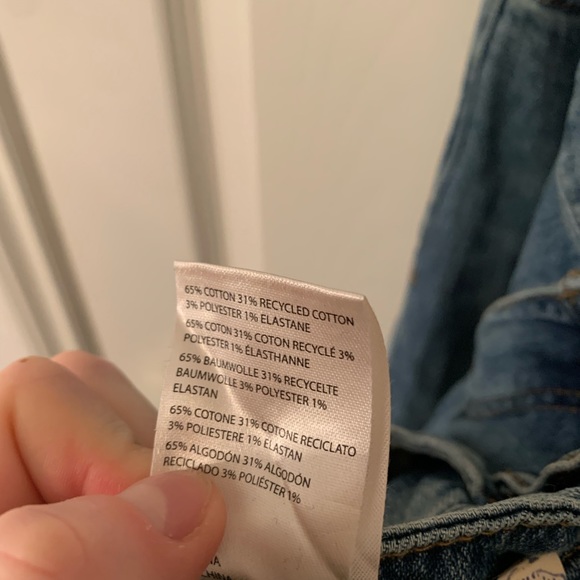 Low rise icon flare mid wash jeans by Anthropologie. - Picture 3 of 4